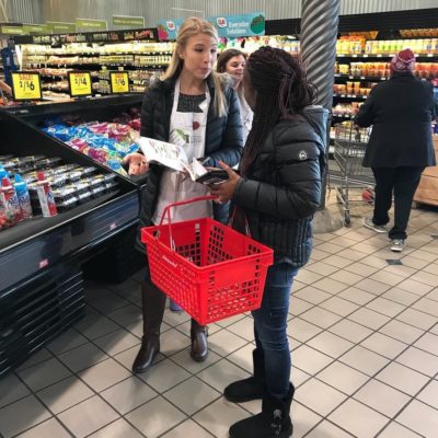 women at grocery store