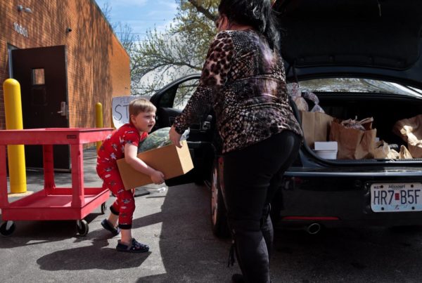 Mom and son lending a helping hand