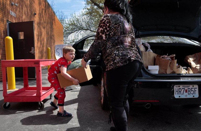 Mom and son lending a helping hand