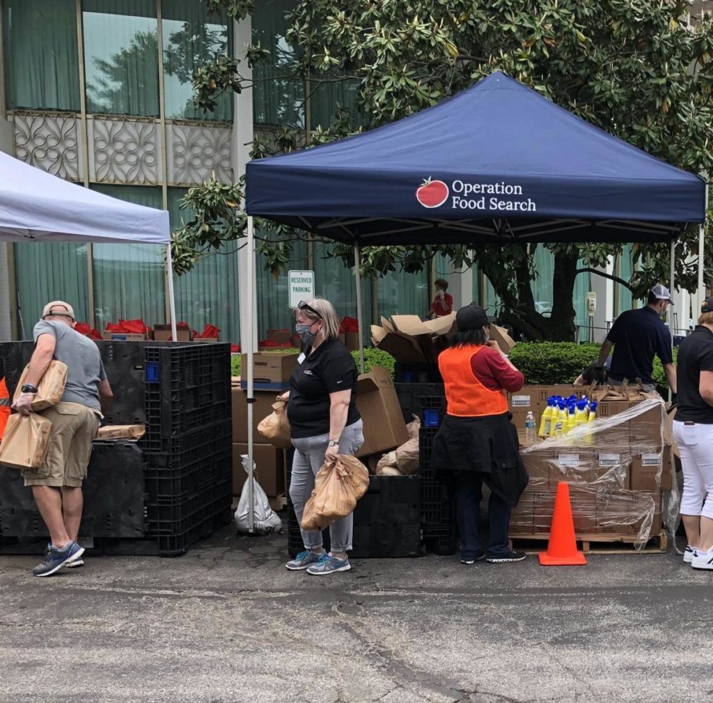 Volunteers at food market