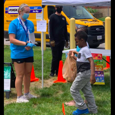 Child donating food