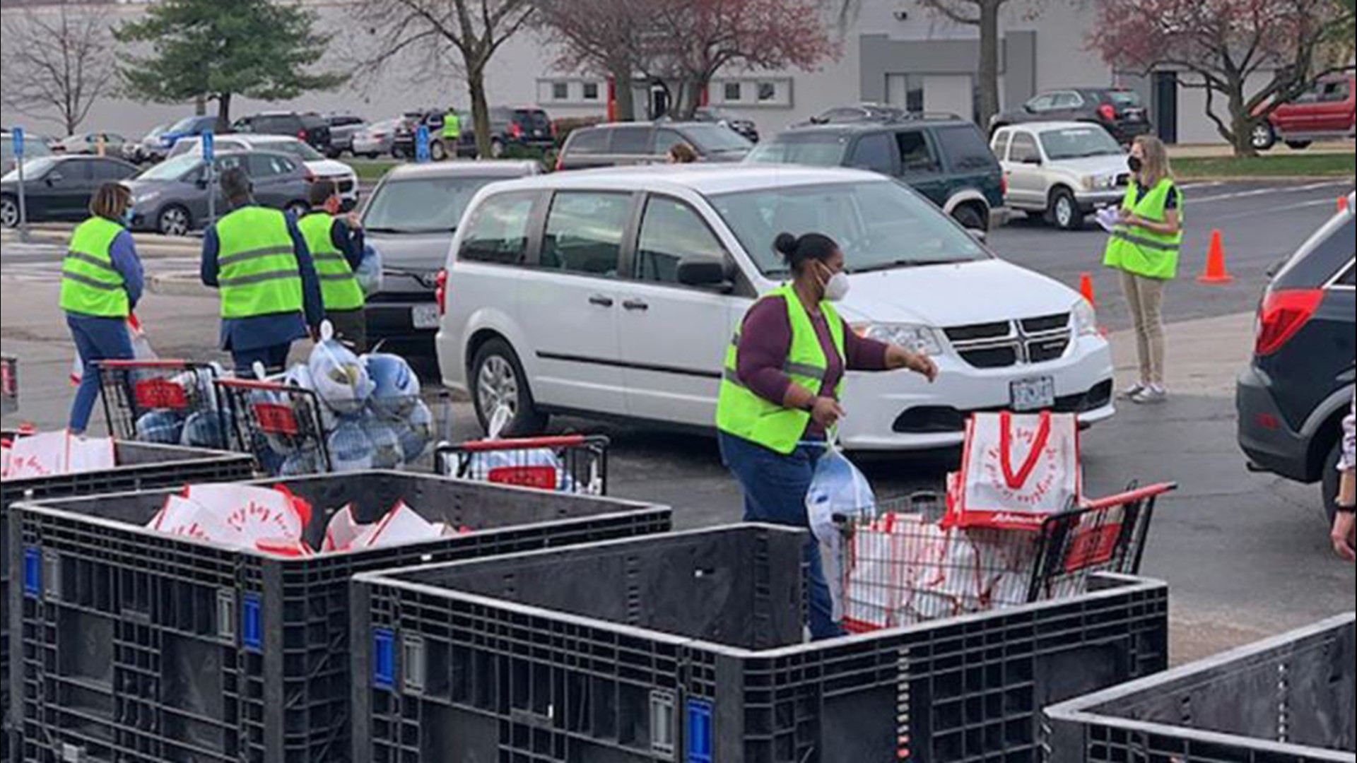 Group of volunteers participating at local food drive