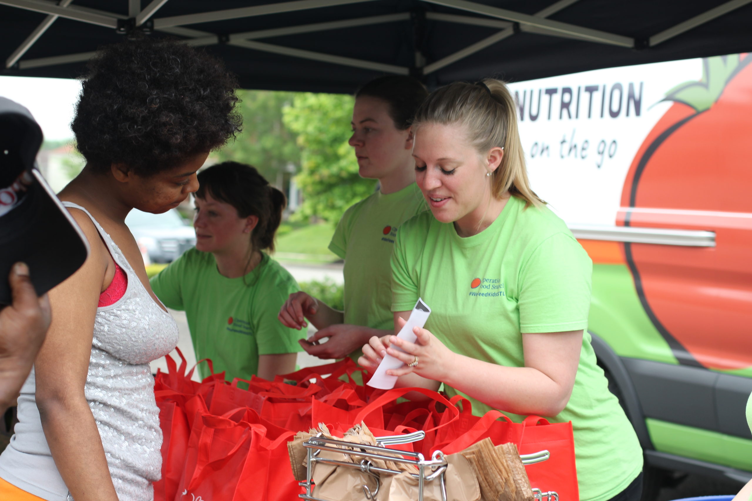 OFS volunteer at food drive