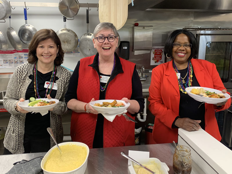 Group of female employees creating an OFS cooking video