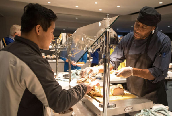 Volunteers collaborate with Enterprise Center employees to alleviate food hunger