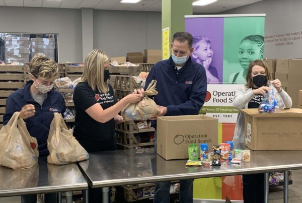 Volunteers from Operation Food Search prepare meals to be shipped out to communities around the St. Louis Area.