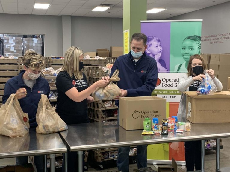 Volunteers from Operation Food Search prepare meals to be shipped out to communities around the St. Louis Area.