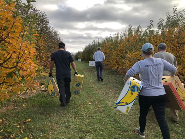 Group of volunteers at a local farm