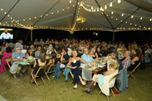 Overview shot of people seated at Feast for Change Event