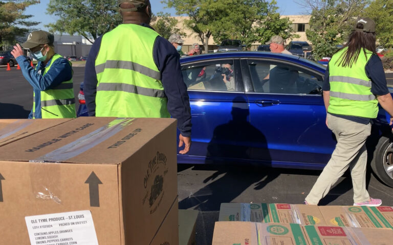 car going through food donation