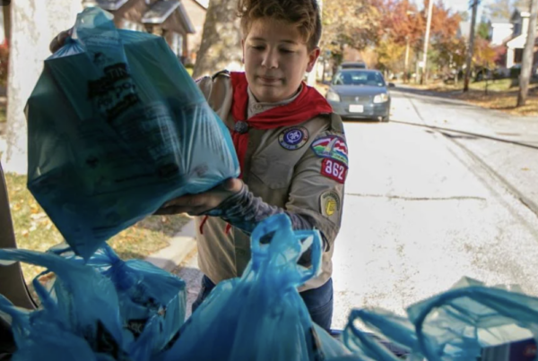 Boy Scout collecting donations