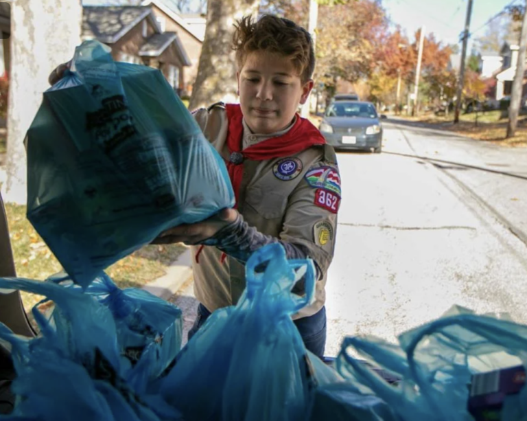 Boy Scout collecting donations