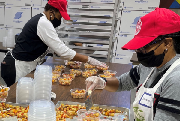 workers preparing food for fresh rx