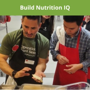 Man teaching others how to cook