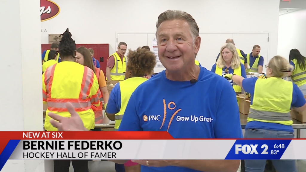 Bernie Federko volunteering at Operation Food Search